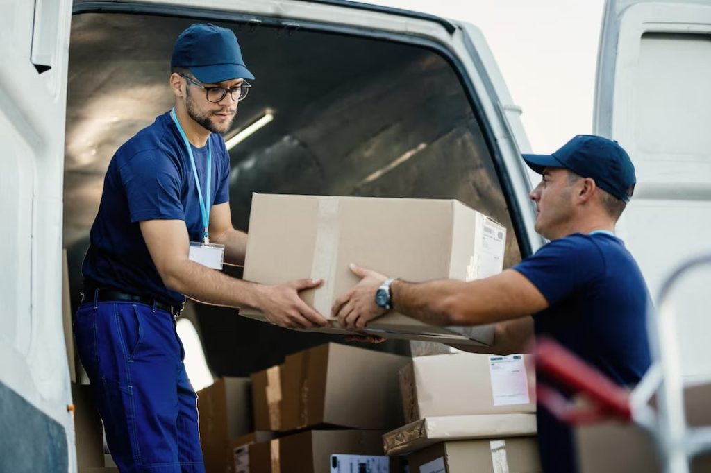 Delivery Men Loading Cardboard boxes