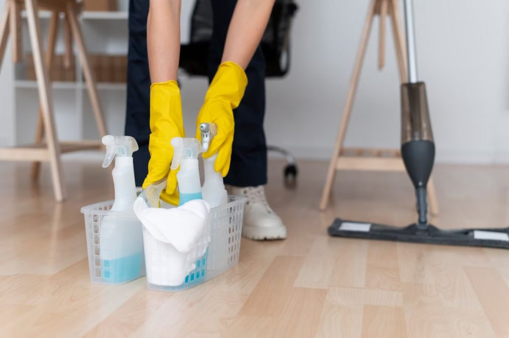 Person deep cleaning the office