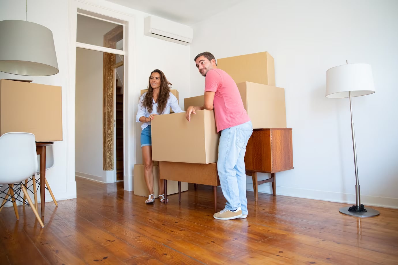 Young Couple Looking for their new apartment moving their stuff